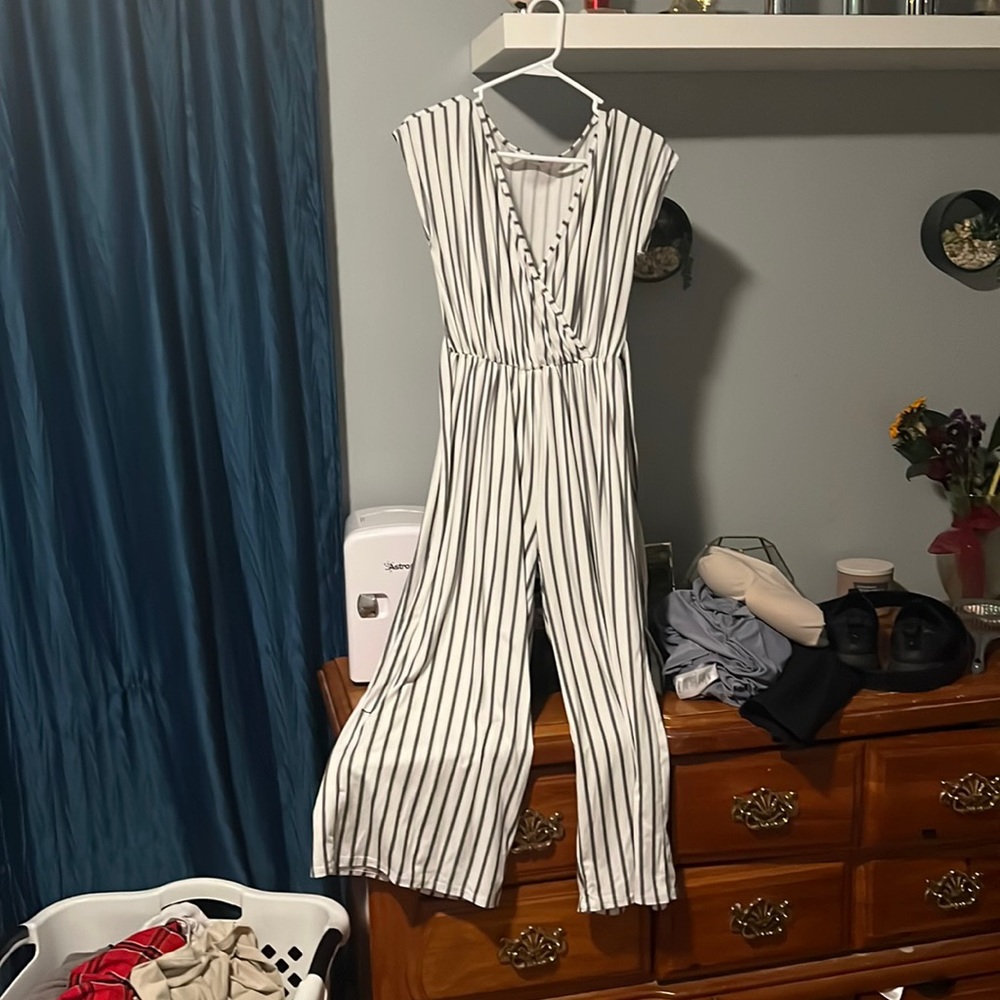 black and white stripped jumpsuit with tie in the front, size m